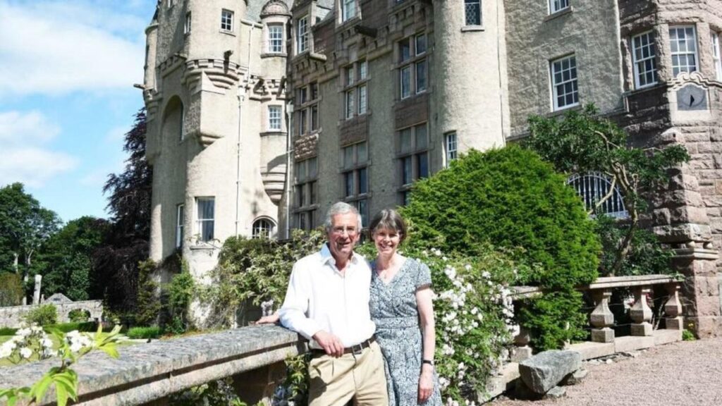 a couple in front of Kincardine Castle